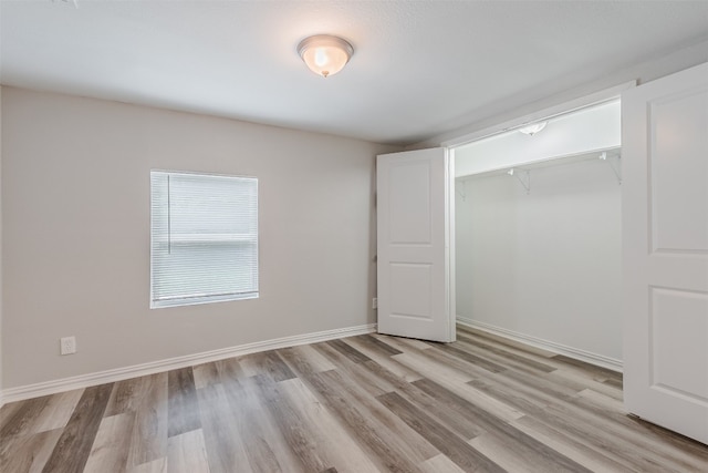 empty room with light wood-type flooring