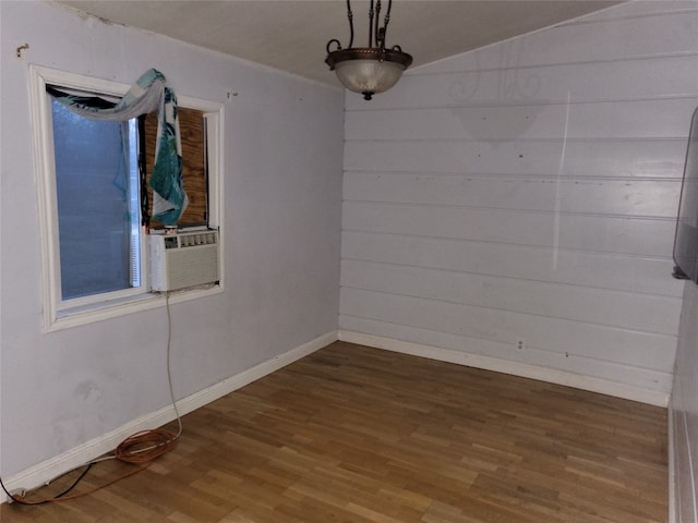 empty room featuring dark wood-type flooring