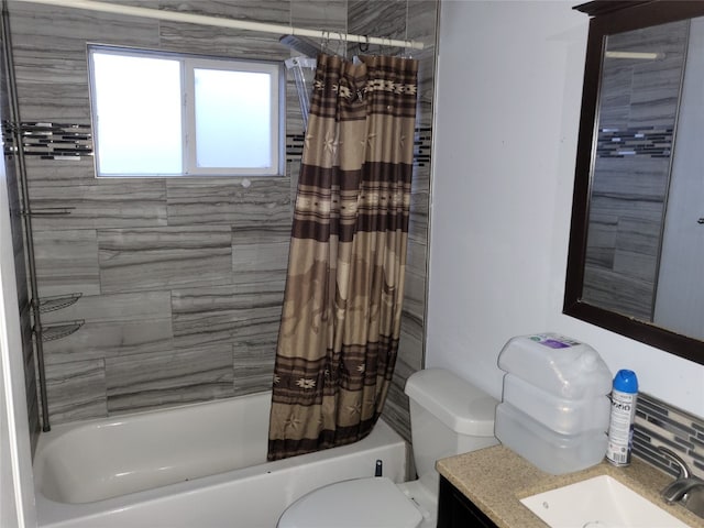 full bathroom with shower / tub combo with curtain, vanity, and toilet