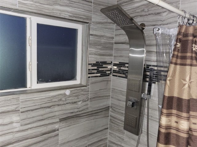 bathroom with a shower with shower curtain