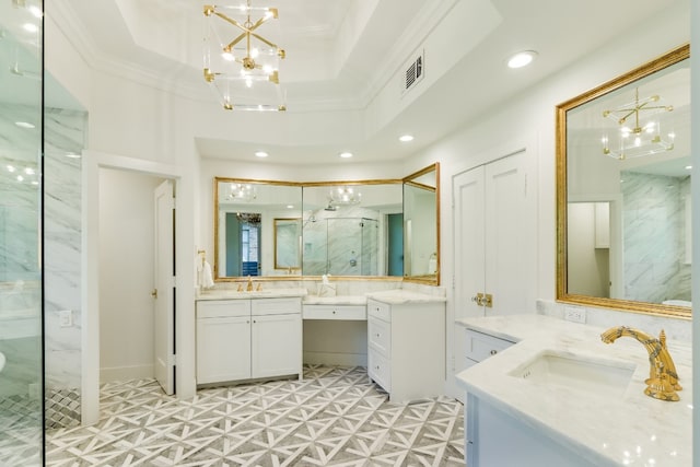 bathroom featuring a shower with shower door, vanity, ornamental molding, a raised ceiling, and an inviting chandelier