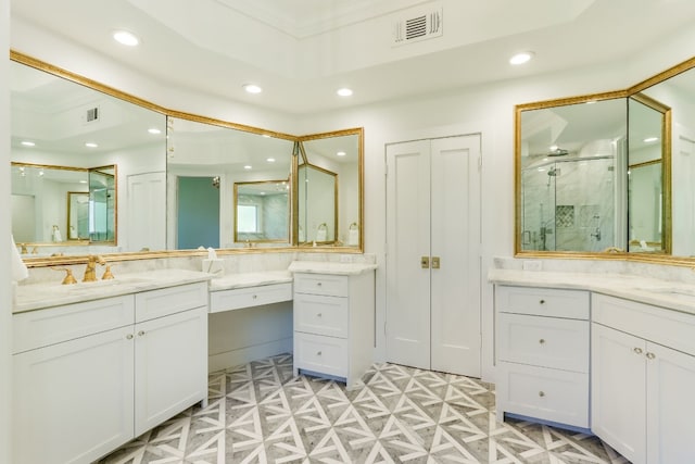 bathroom featuring walk in shower and vanity