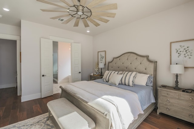 bedroom with ceiling fan and dark hardwood / wood-style floors