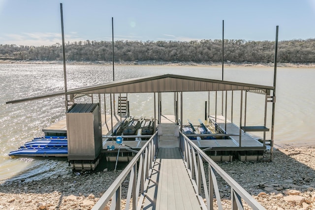 view of dock with a water view