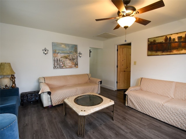 living room with dark hardwood / wood-style floors and ceiling fan