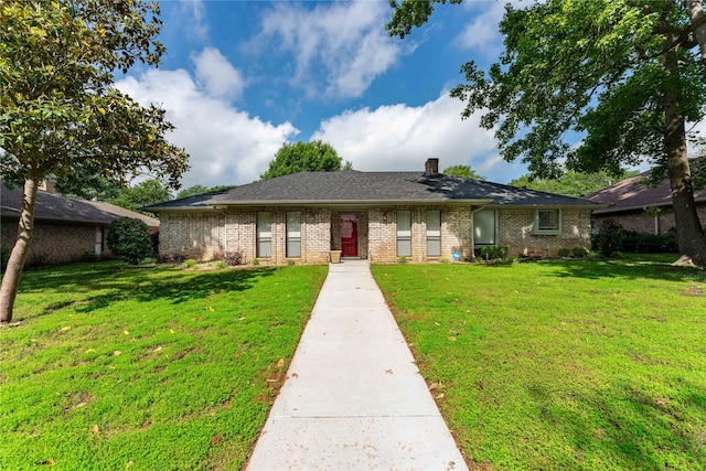 ranch-style house with a front lawn