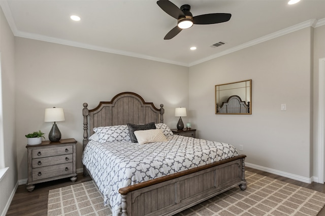 bedroom featuring ornamental molding, wood-type flooring, and ceiling fan