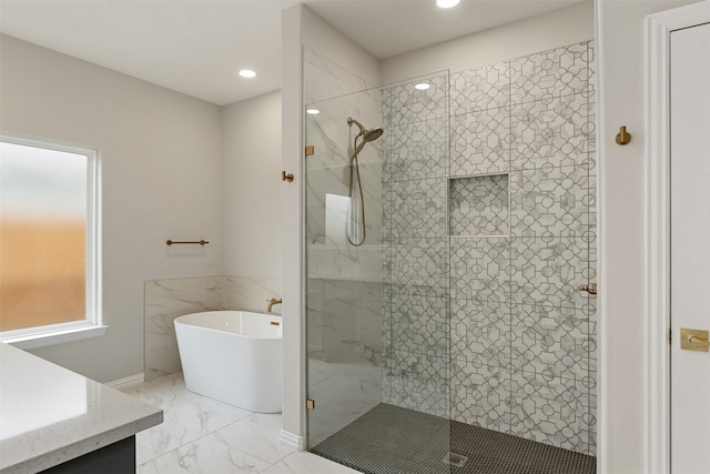 bathroom featuring vanity, tile patterned floors, and separate shower and tub