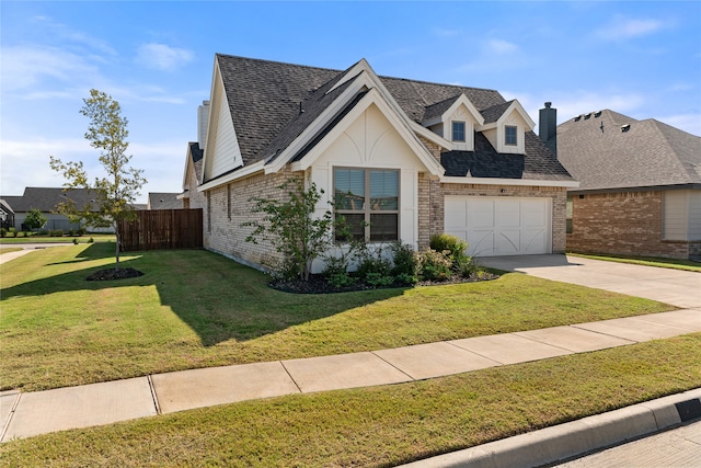 view of front facade featuring a garage and a front yard