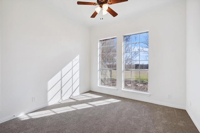 carpeted empty room with ceiling fan