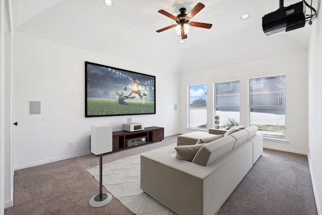 carpeted living room featuring ceiling fan and vaulted ceiling