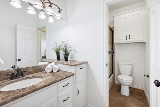 full bathroom with shower / bath combination with glass door, vanity, toilet, and tile patterned flooring