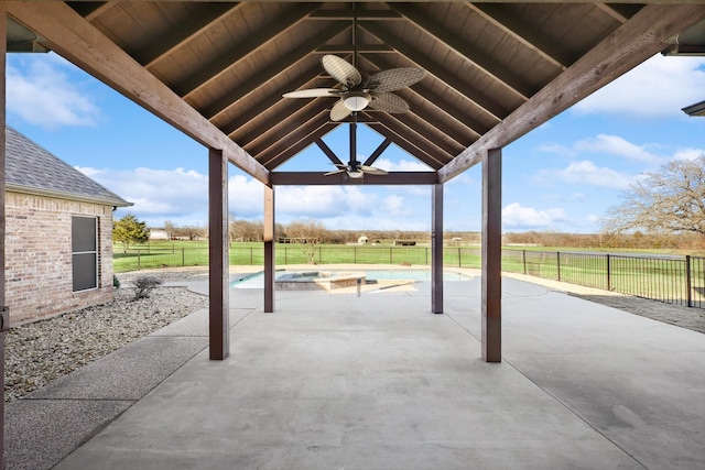 view of patio with ceiling fan, a fenced in pool, and a gazebo