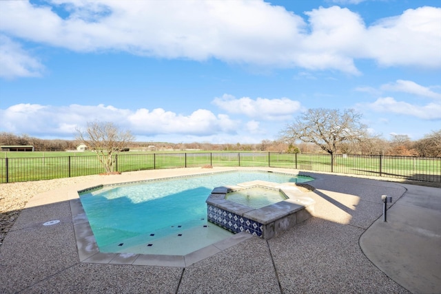 view of pool featuring an in ground hot tub and a patio