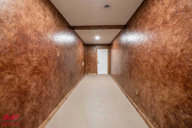 hallway with carpet floors