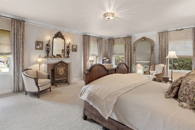 carpeted bedroom with ornamental molding