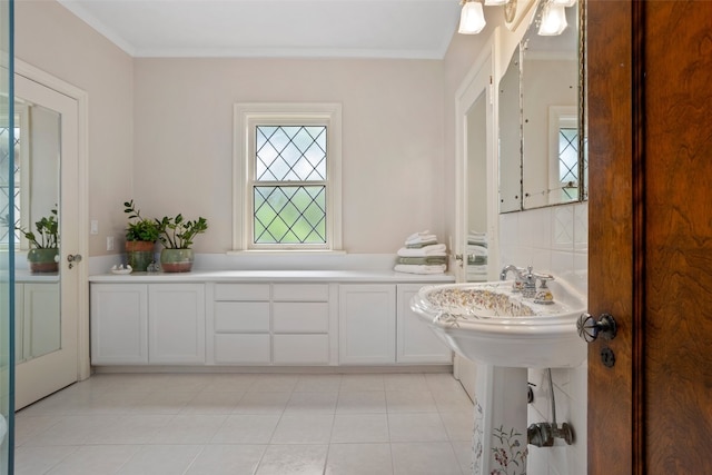 bathroom with crown molding and tile floors