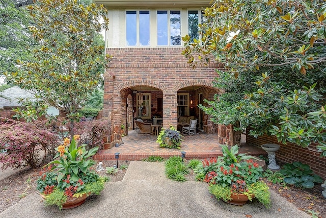 property entrance with a patio