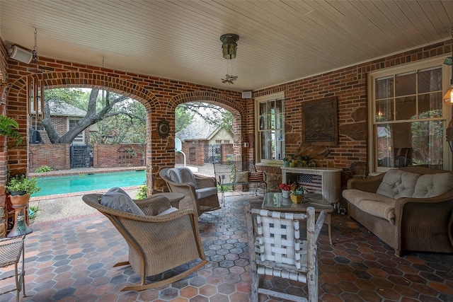 view of terrace featuring outdoor lounge area and a fenced in pool