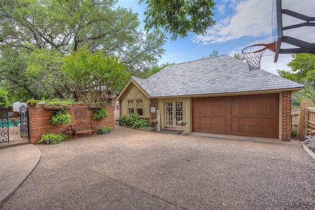 view of front of house featuring french doors and a garage