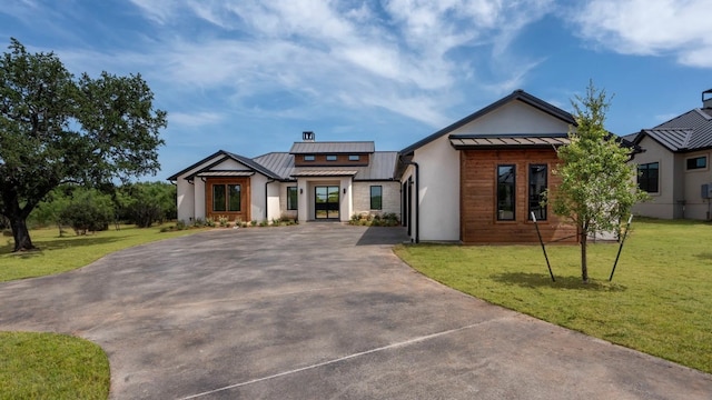 view of front of home with a front lawn