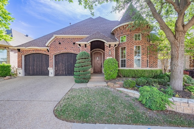 view of front of home with a garage