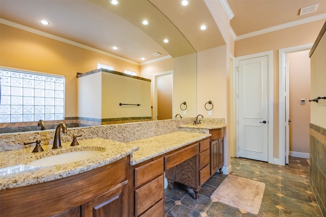 bathroom with tile floors, crown molding, and double vanity