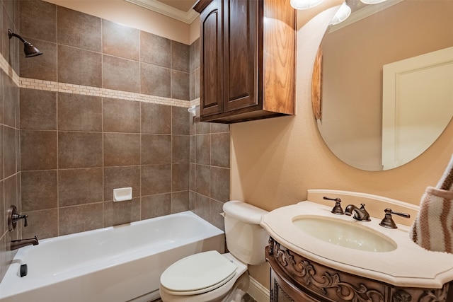 full bathroom featuring tiled shower / bath combo, crown molding, toilet, and vanity