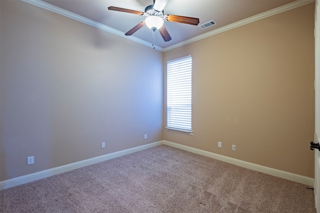 unfurnished room featuring crown molding, light colored carpet, and ceiling fan