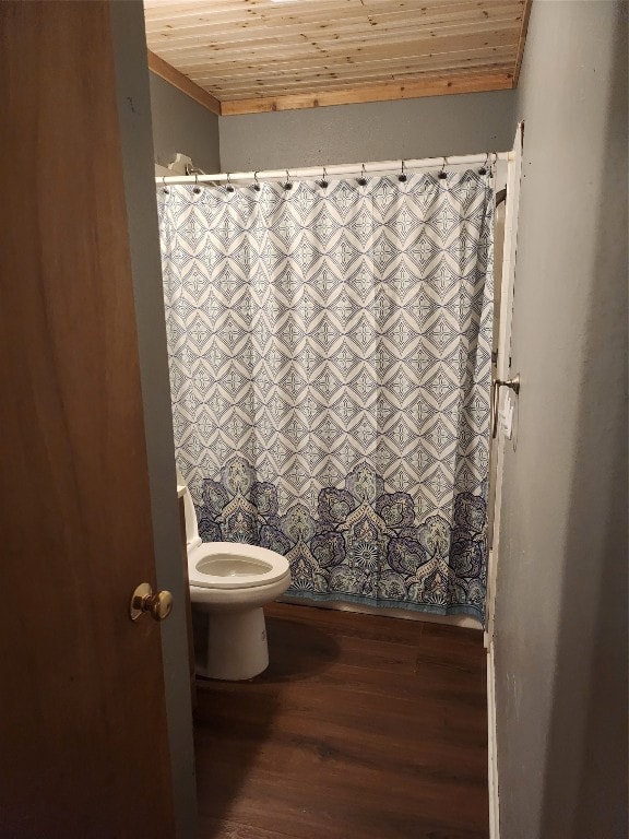 bathroom featuring hardwood / wood-style flooring, toilet, and wooden ceiling