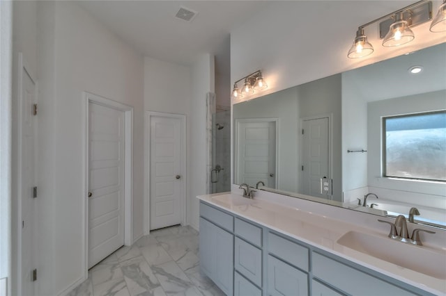 bathroom with oversized vanity, shower with separate bathtub, double sink, and tile flooring