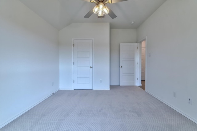 unfurnished bedroom featuring a closet, ceiling fan, and dark carpet