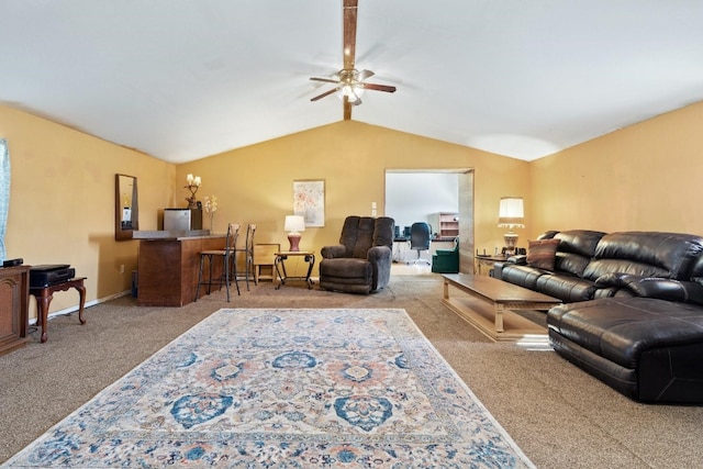 living room with ceiling fan, lofted ceiling, and carpet