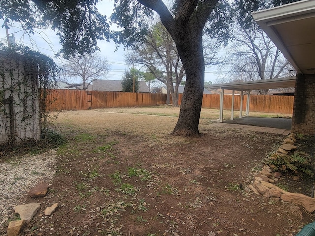 view of yard with a carport