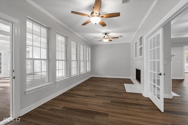 unfurnished room with crown molding, dark hardwood / wood-style flooring, and ceiling fan