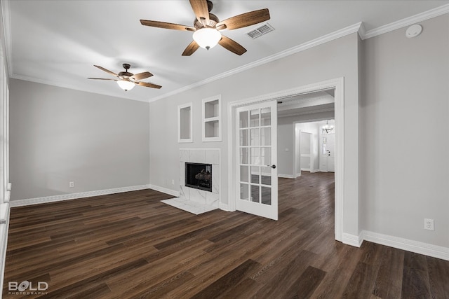 unfurnished living room with ceiling fan, ornamental molding, a fireplace, and dark hardwood / wood-style floors