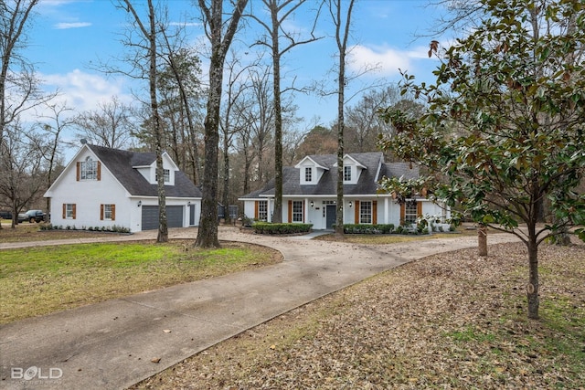 cape cod home featuring a porch and a front lawn