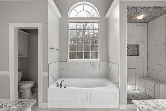 bathroom with independent shower and bath, tile floors, toilet, and ornamental molding