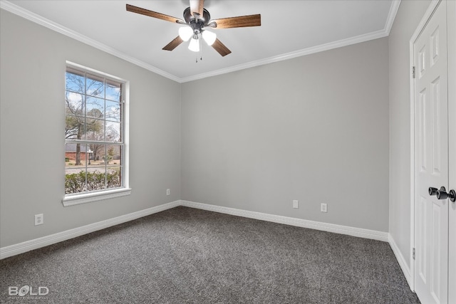 carpeted empty room featuring ceiling fan and crown molding