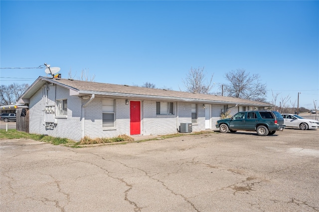 single story home with central AC unit