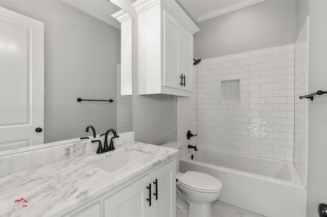 full bathroom with tile floors, tiled shower / bath combo, large vanity, toilet, and ornamental molding