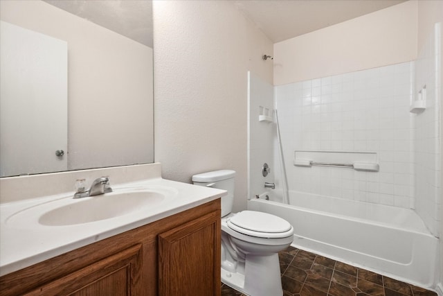 full bathroom featuring  shower combination, toilet, vanity, and tile flooring