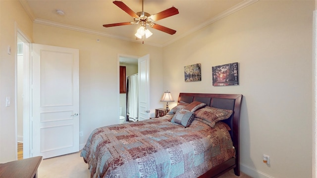 carpeted bedroom featuring crown molding and ceiling fan