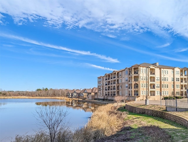 view of building exterior featuring a water view