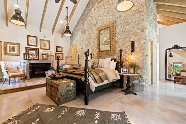 bedroom with beam ceiling and high vaulted ceiling