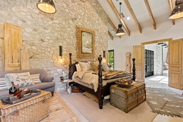 bedroom with light hardwood / wood-style flooring, high vaulted ceiling, and beamed ceiling