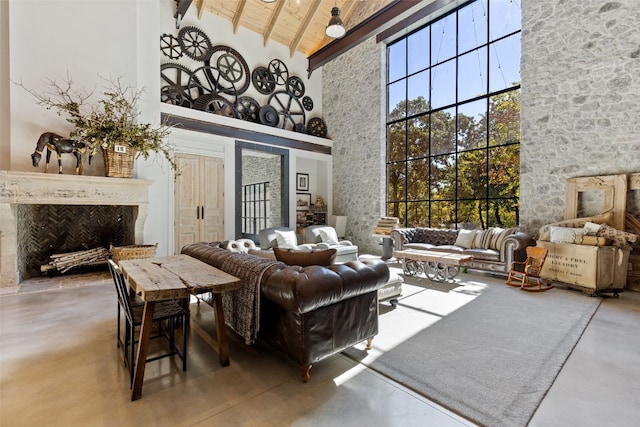 interior space with high vaulted ceiling, wood ceiling, and beamed ceiling