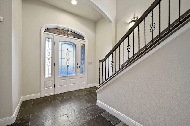 foyer entrance with a healthy amount of sunlight