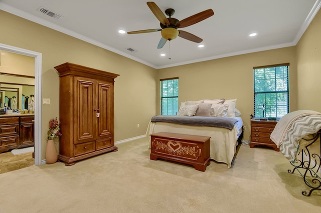 bedroom with ceiling fan, light colored carpet, and multiple windows