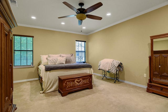 bedroom featuring ceiling fan, light colored carpet, and ornamental molding